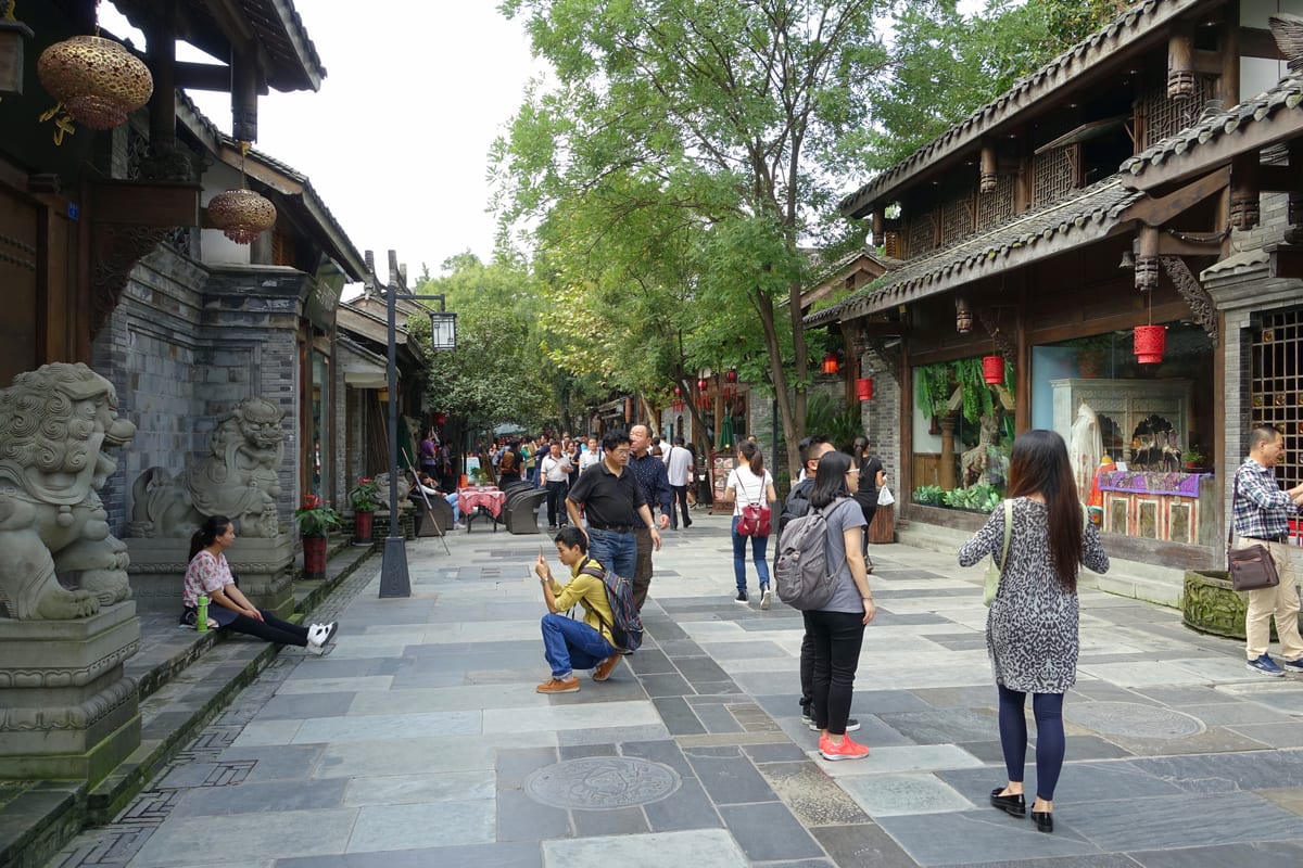 Stone-paved lane in Chengdu's Kuanzhai Alley lined with restored Qing-dynasty courtyard houses
