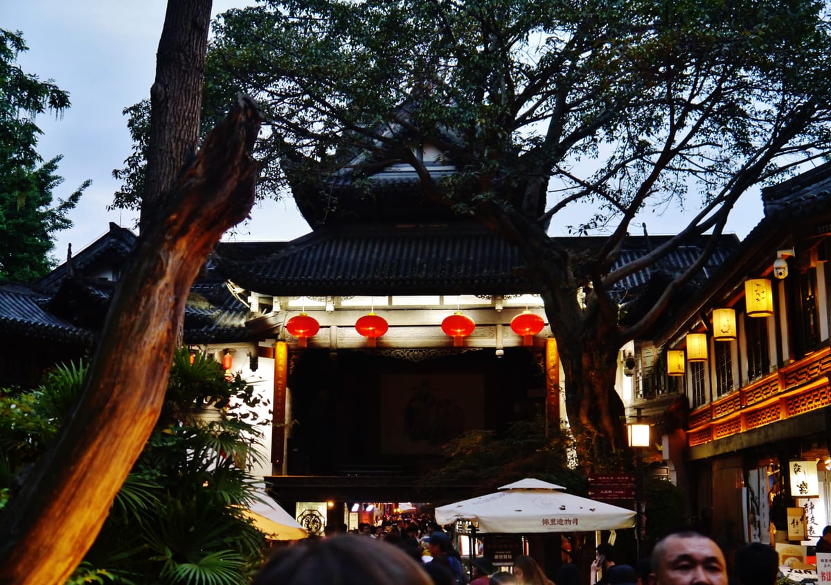 Jinli Ancient Street at dusk with red lanterns and traditional Sichuan architecture in Chengdu