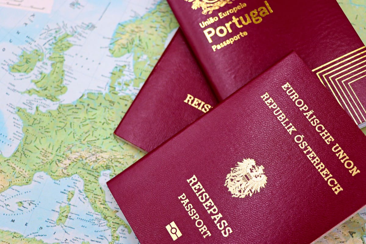 International passports resting on a map while planning a trip to China