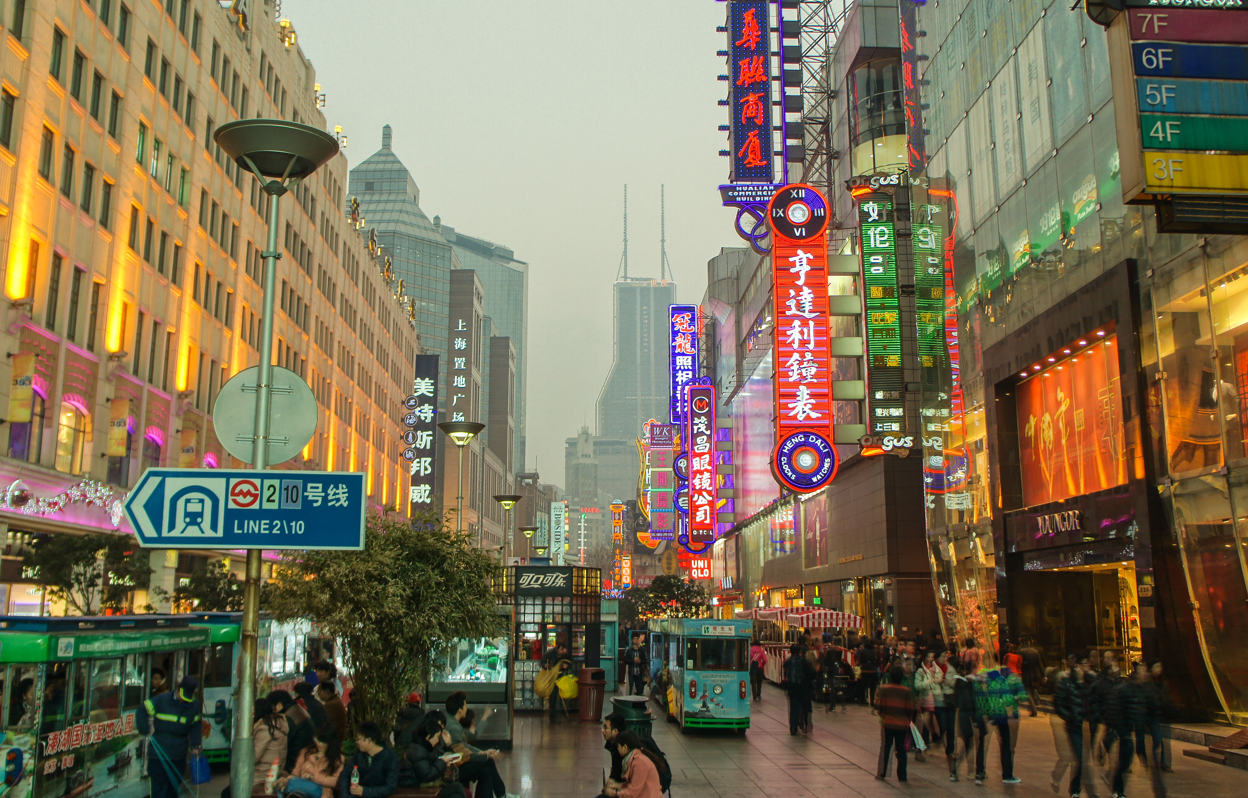 Crowds and neon signs along the East Nanjing Road pedestrian shopping street