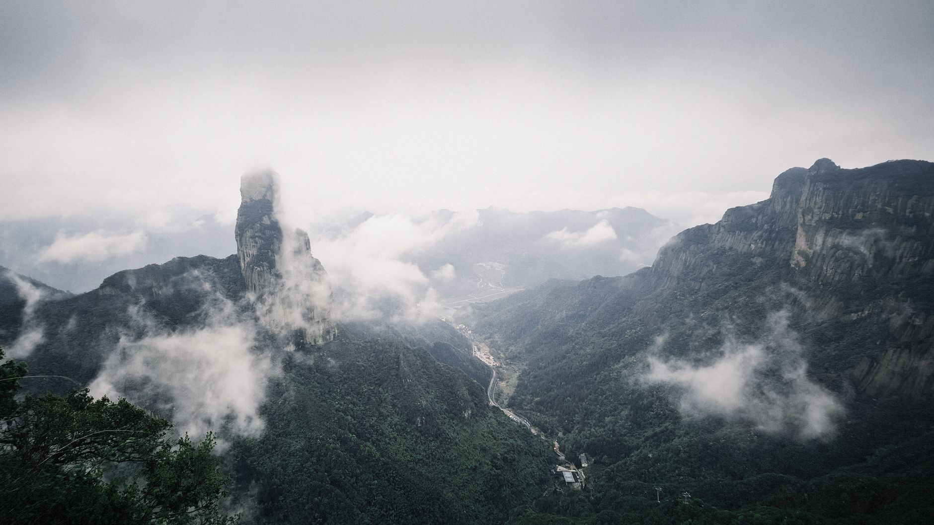 Mist-wrapped sandstone peaks of Tianzi Mountain