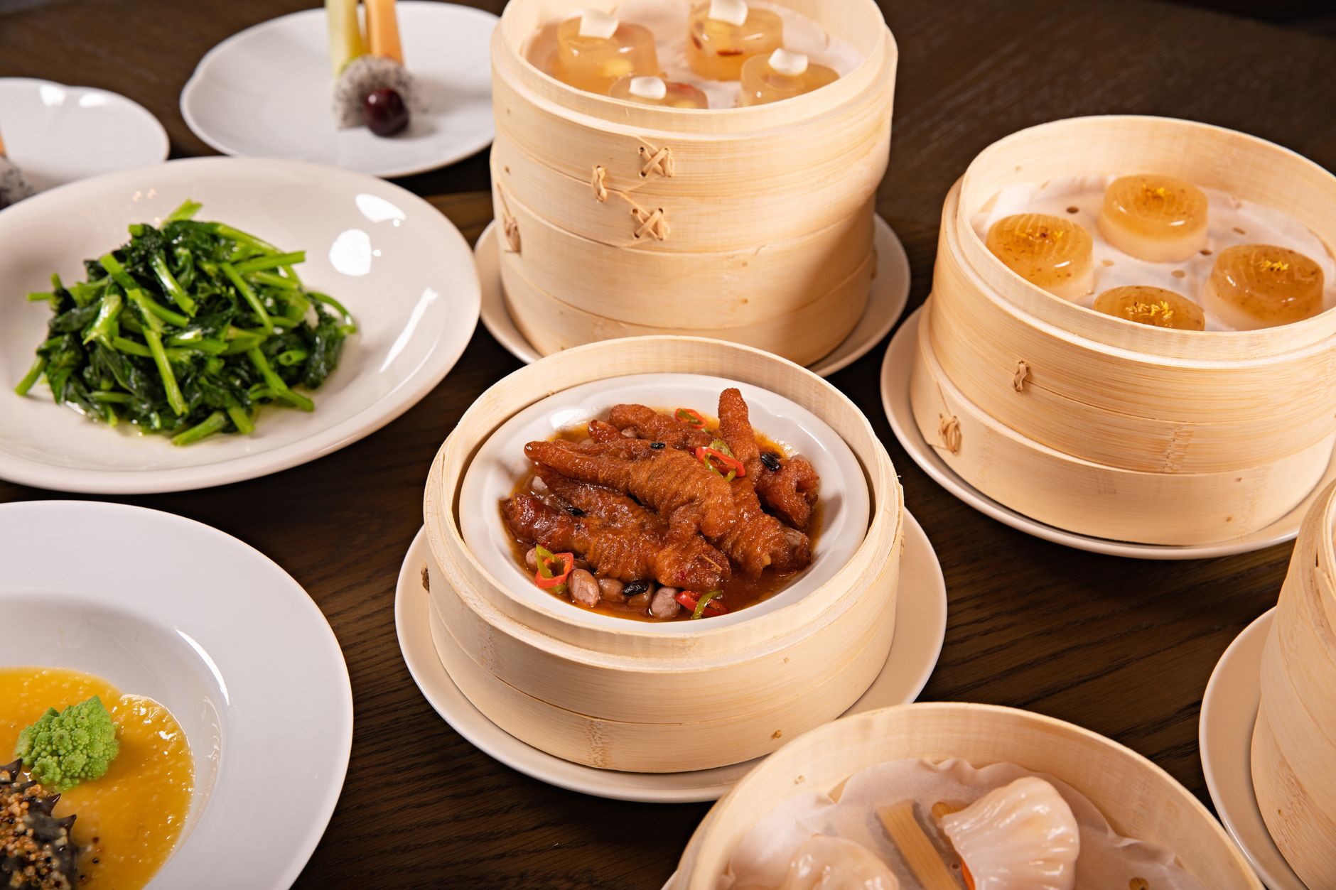 A spread of Cantonese dim sum in bamboo steamers