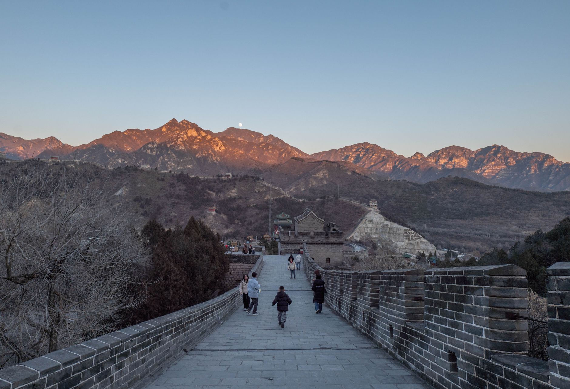Families walking a restored stretch of the Great Wall near Beijing