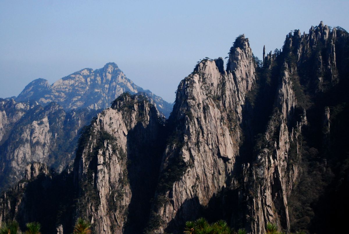 Sharp granite spires of Huangshan seen from a hiking trail