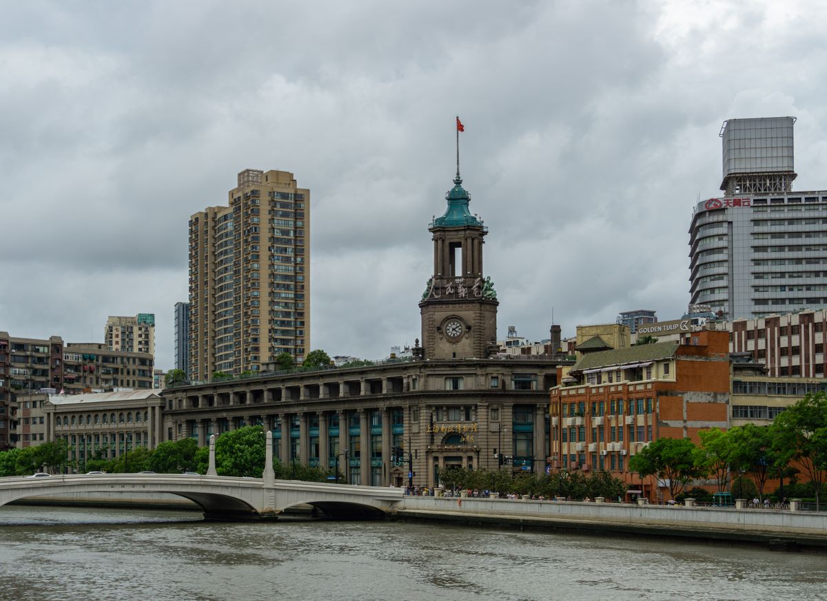 Historic Bund waterfront buildings lit up at night in Shanghai