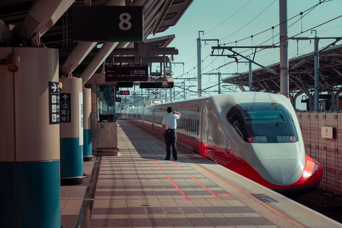 High-speed G-train boarding at a railway platform in China