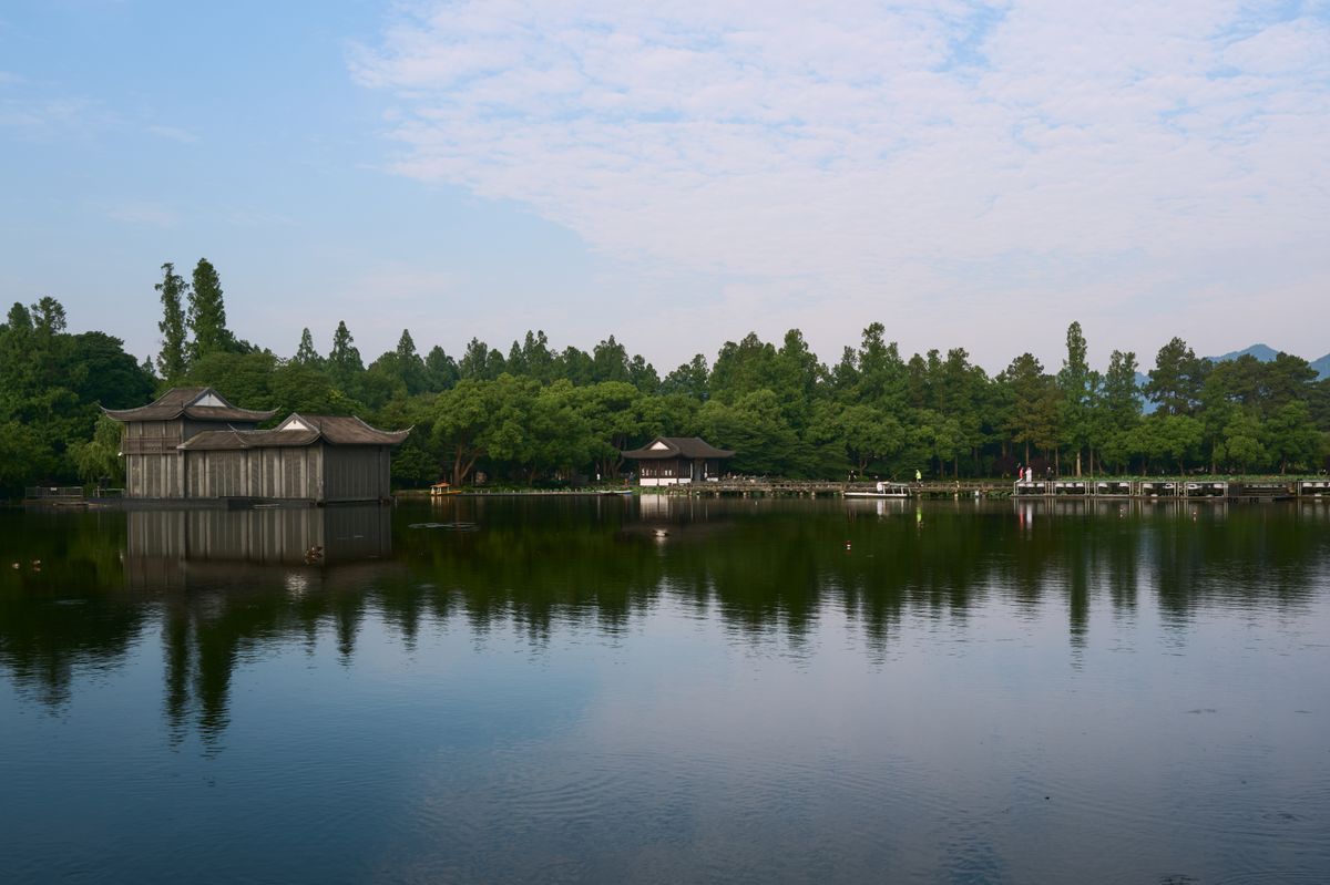 West Lake Hangzhou at dusk with lakeside pavilion