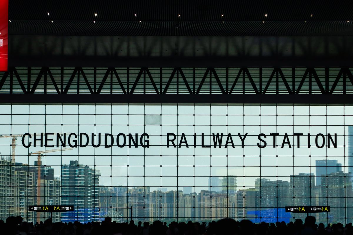 Chengdu East Railway Station signage visible through the terminal's glass facade