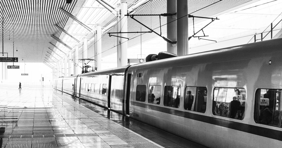 China high-speed train arriving at a platform