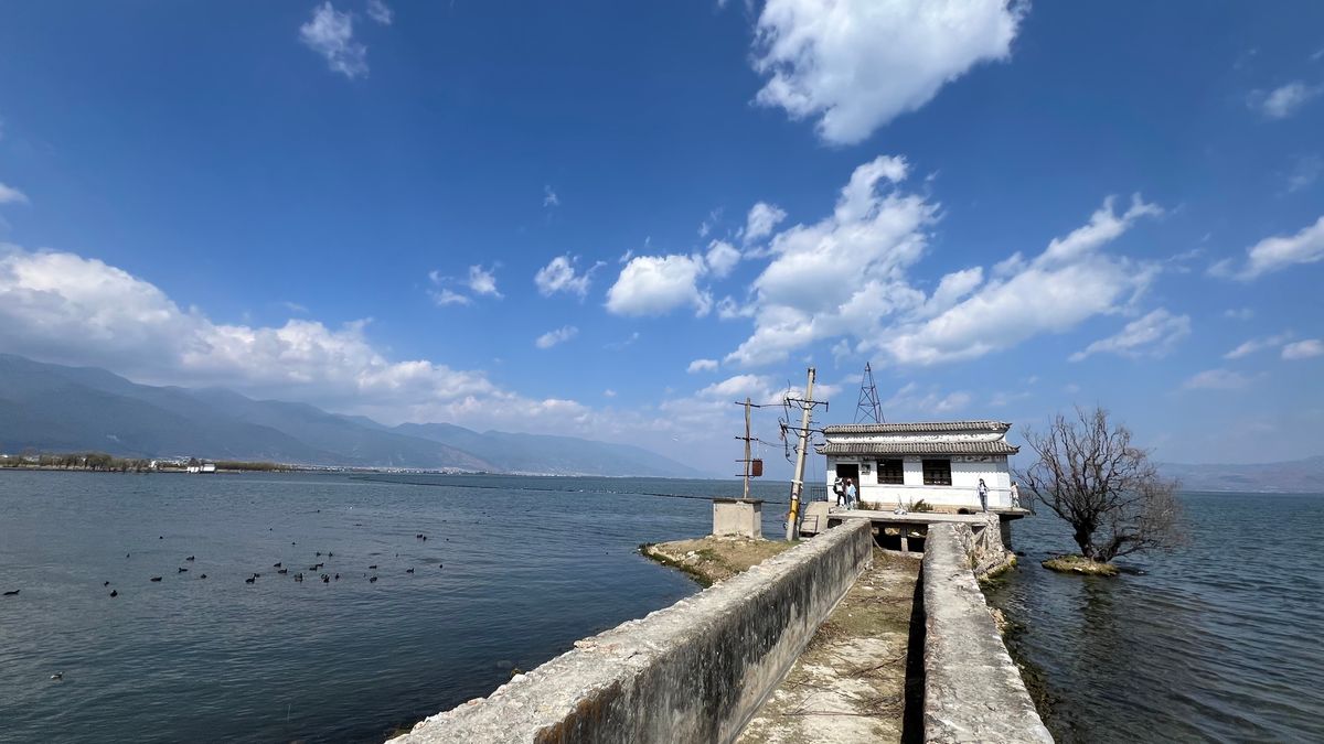 Lakeside house on a stone pier at Er Hai Lake near Dali
