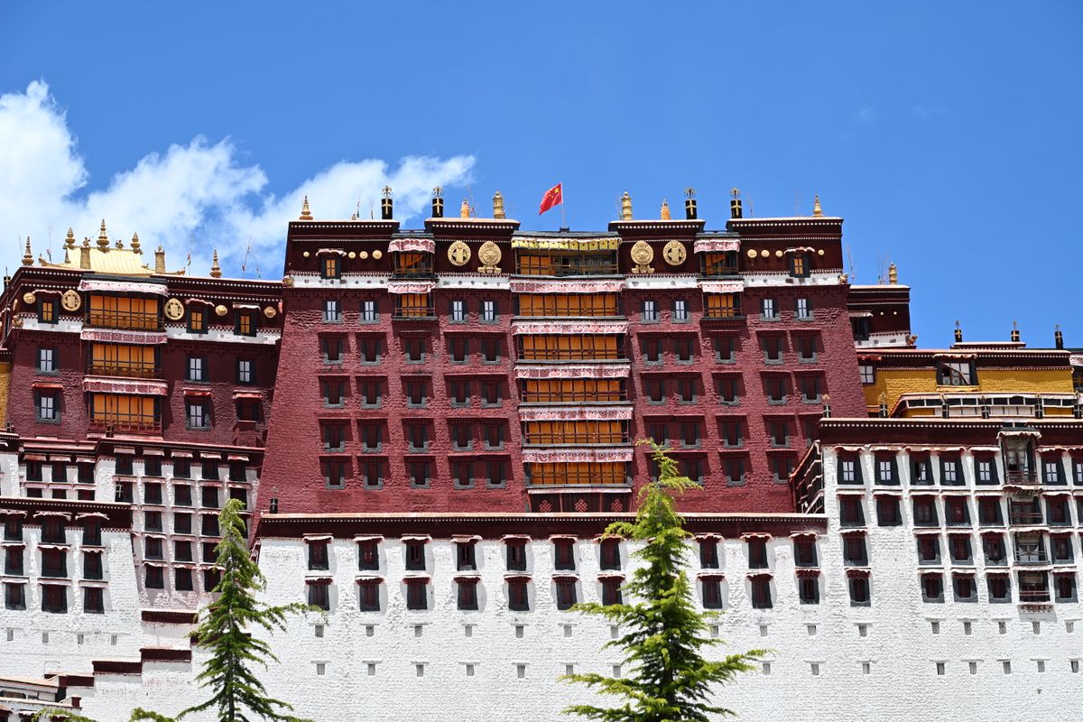 The Potala Palace in Lhasa under a clear blue sky