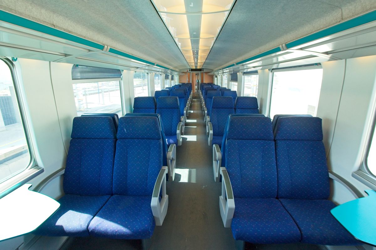 China high-speed train interior with rows of blue seats