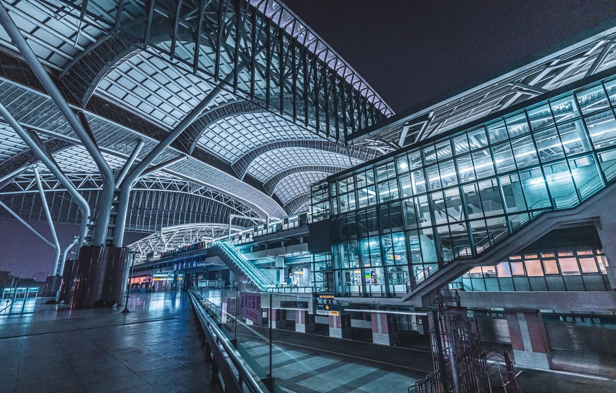 Modern Chinese high-speed rail station at night