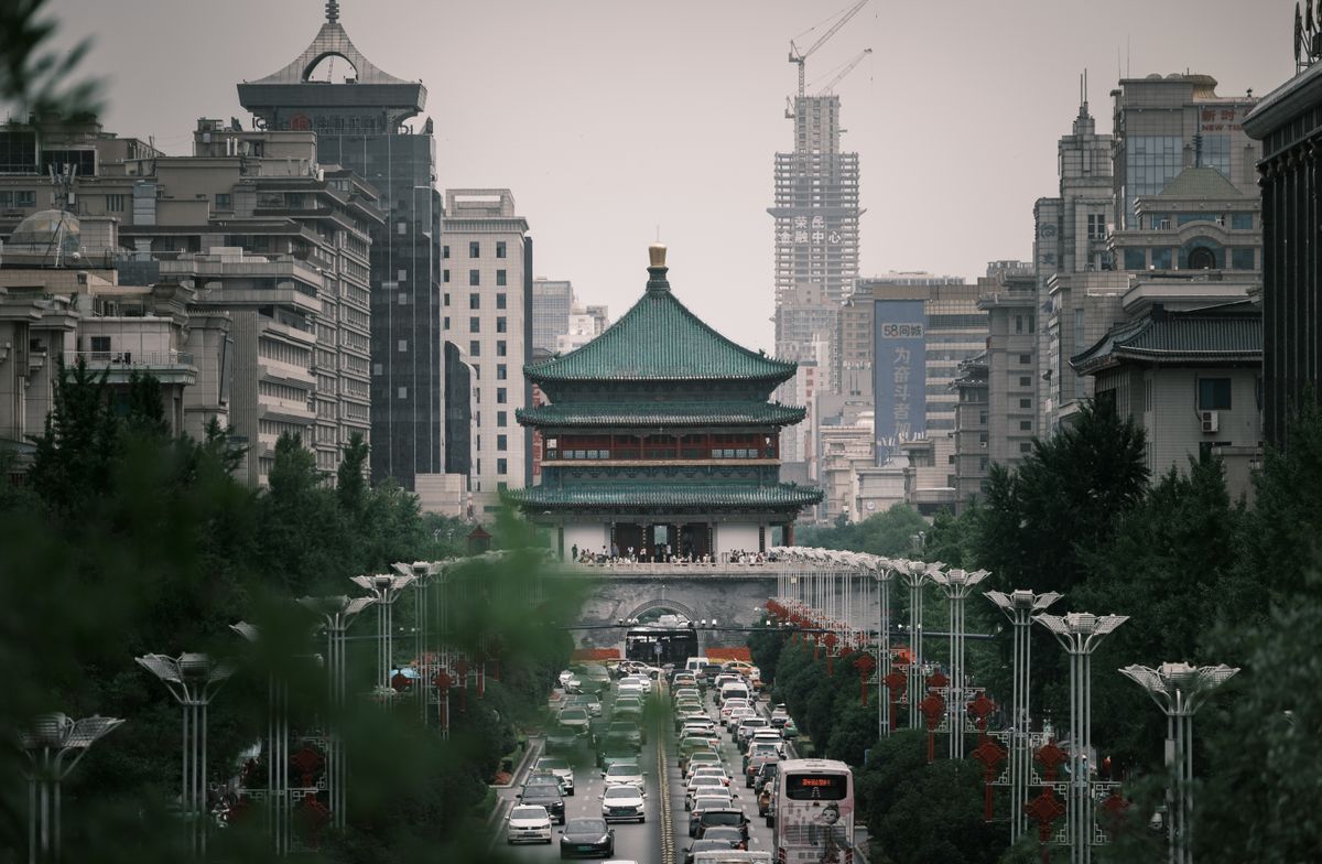 Bell Tower and Xi'an city street at dusk, a common stopover en route to Lhasa