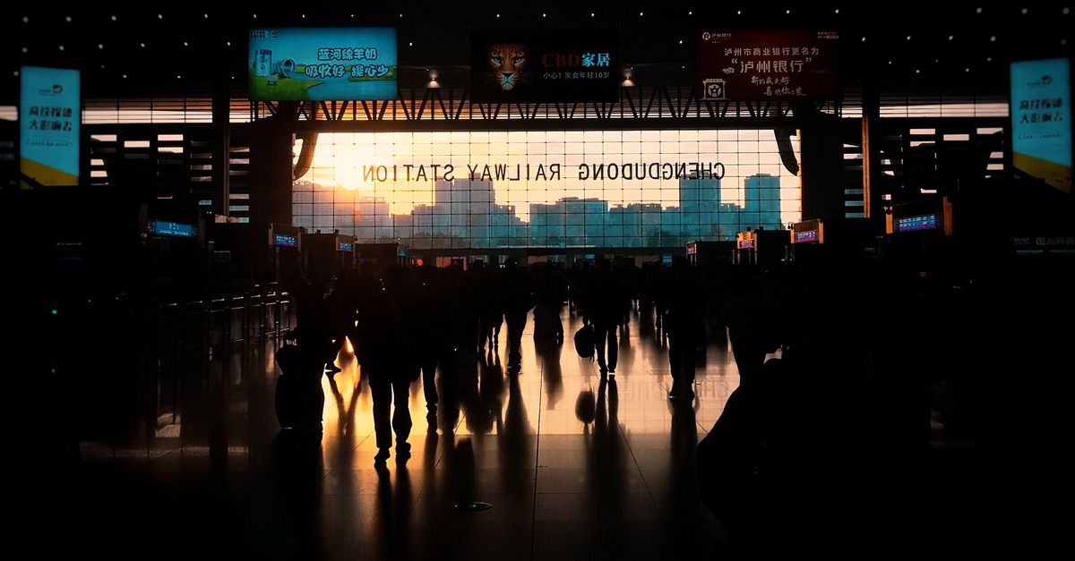 Automated ticket gates at the entrance to a Chinese train station platform