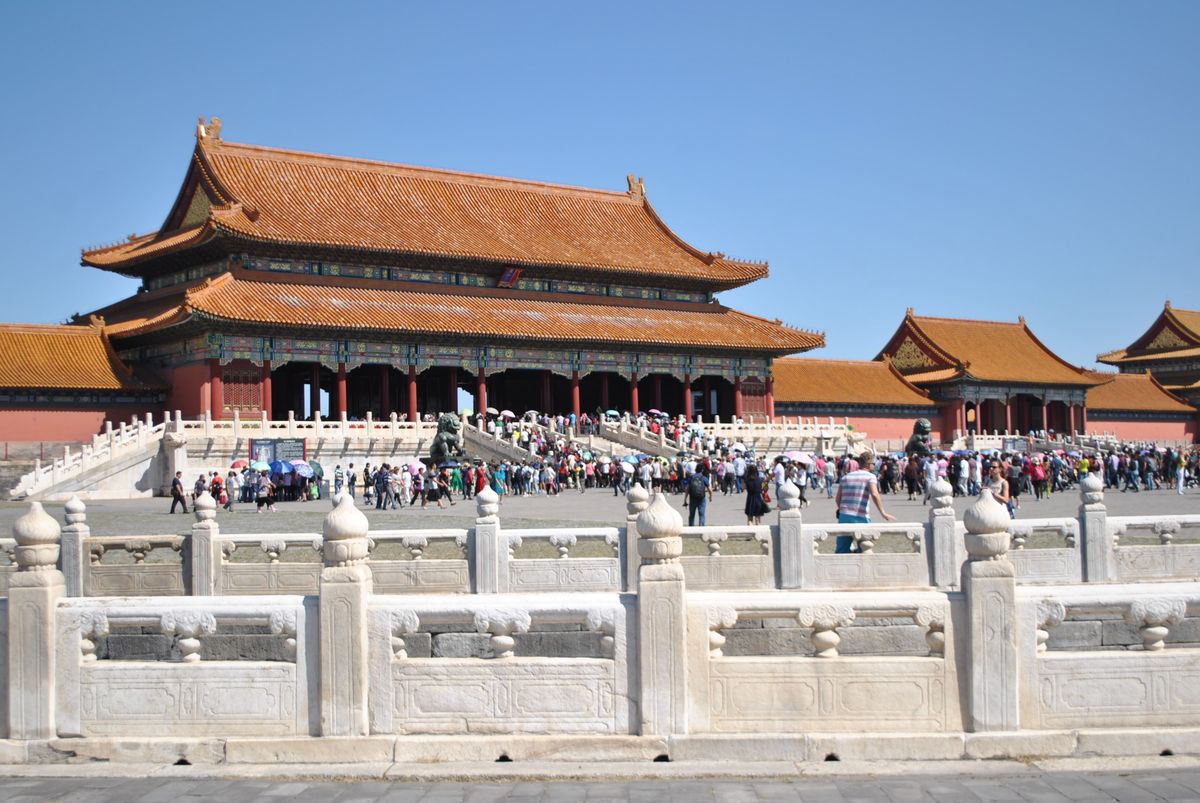 Crowds of tourists in front of the Forbidden City's Meridian Gate in Beijing