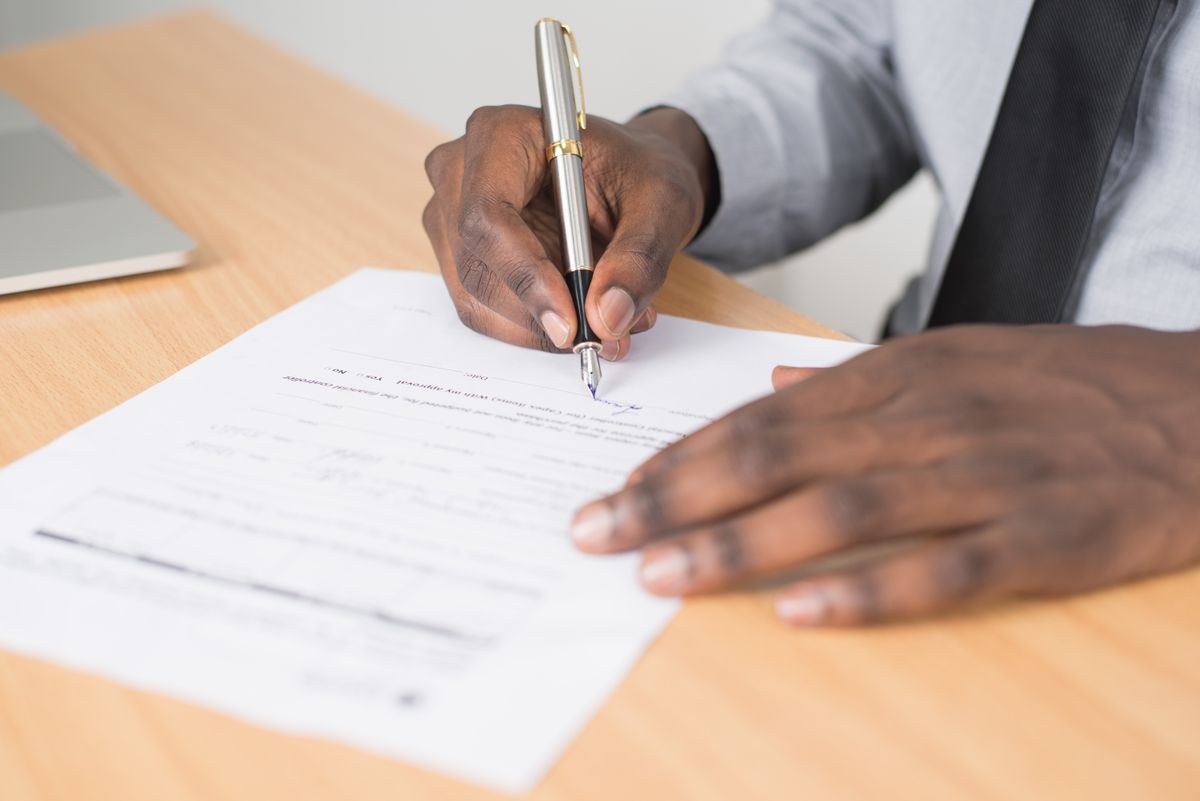 Filling out a work visa application form