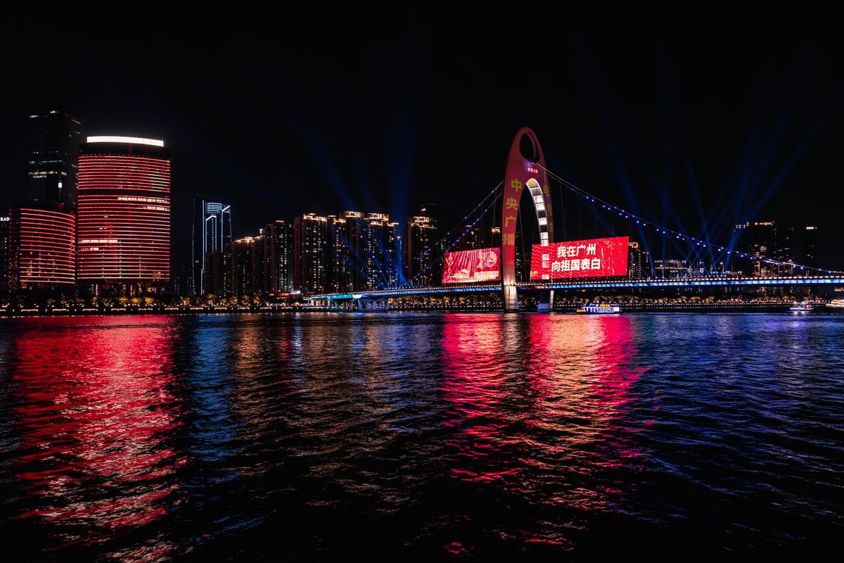 Guangzhou skyline reflected in the Pearl River at night