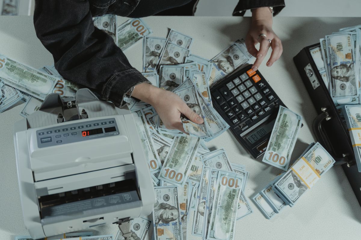 Counting cash with a calculator