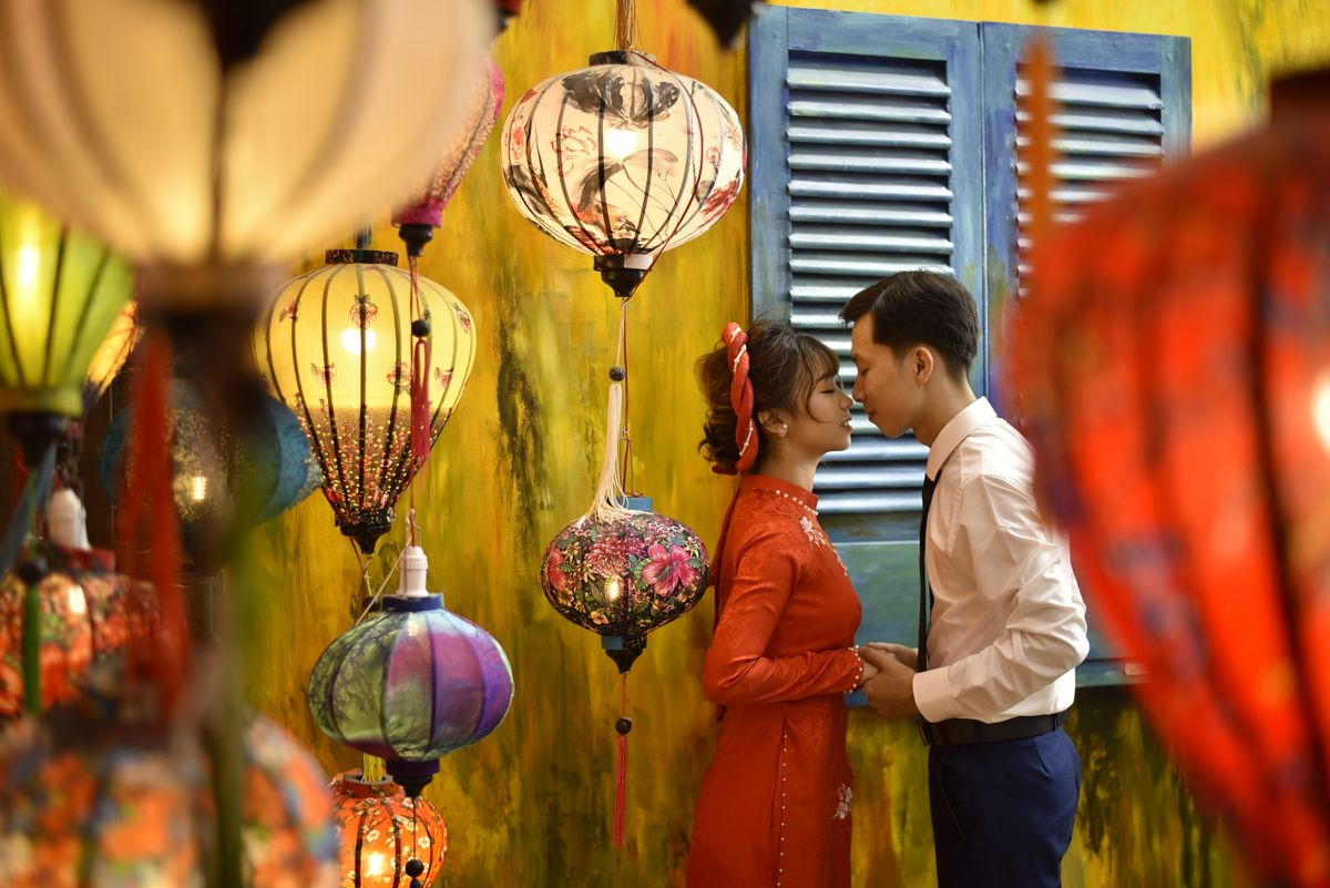 A couple in a romantic Chinese lantern setting