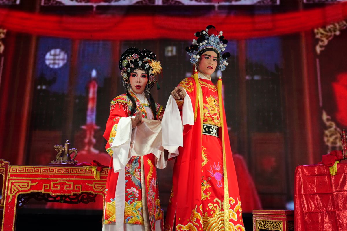 Peking Opera performers in embroidered stage costumes