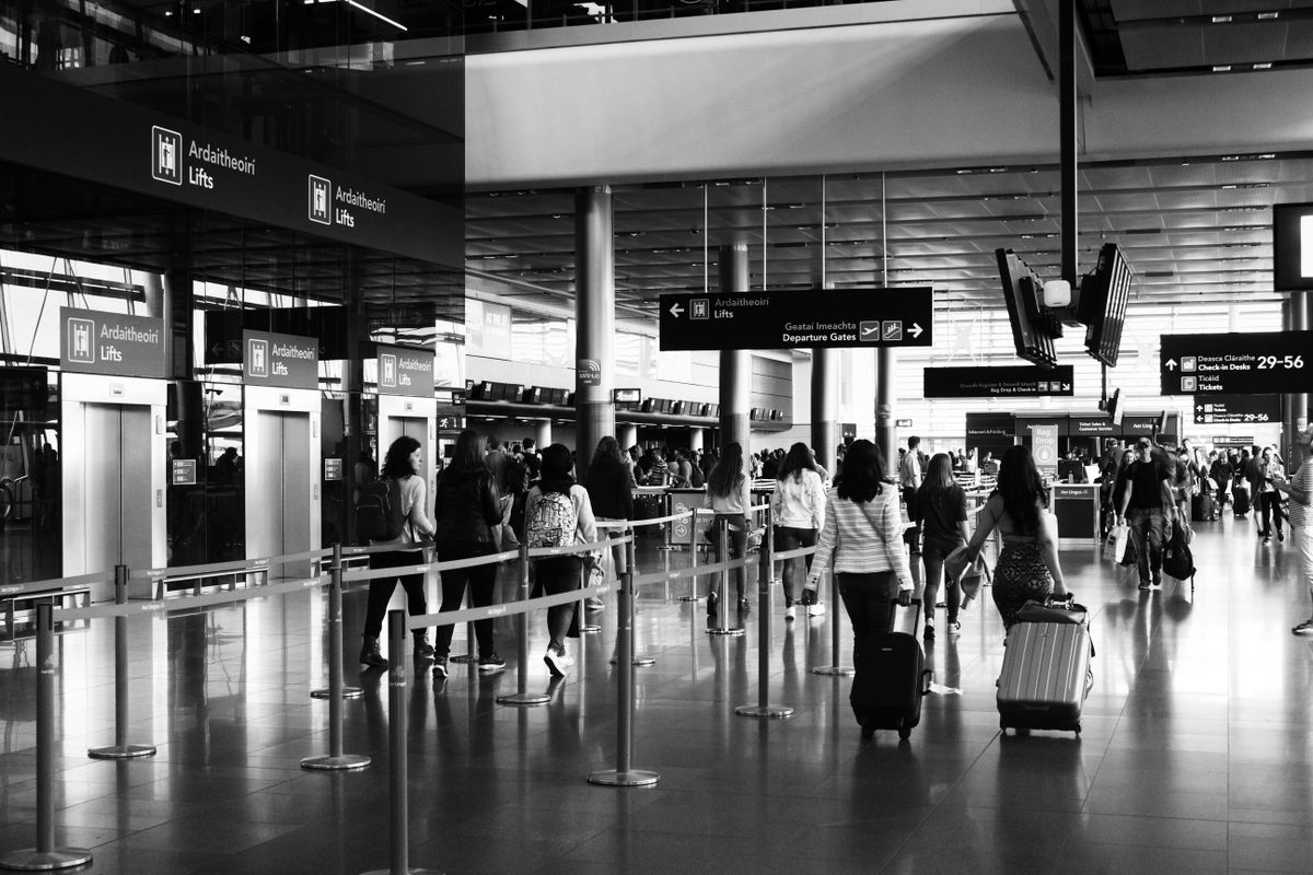 International travelers moving through an airport