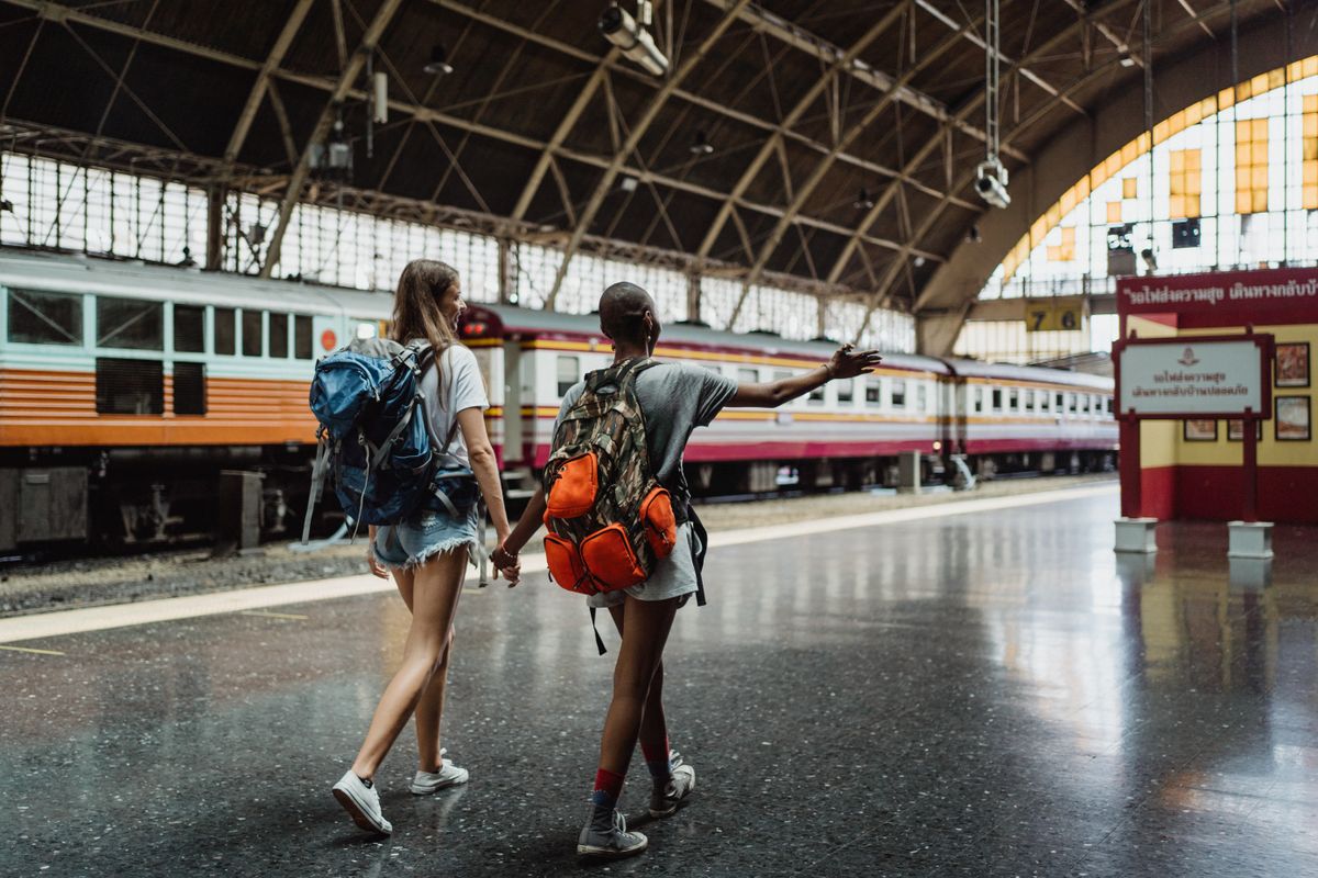 Travelers arriving for a rail journey